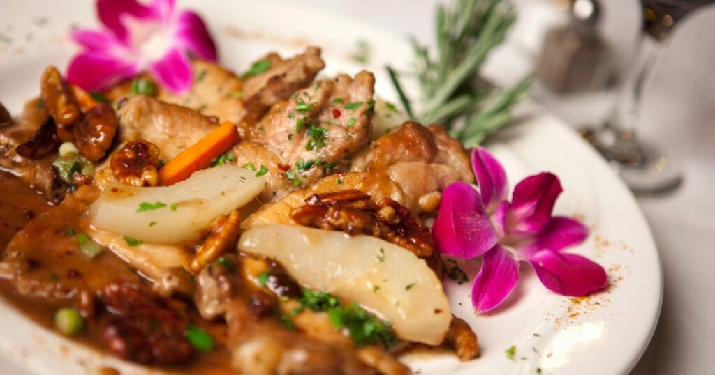 A plate with potatoes, carrots and meat